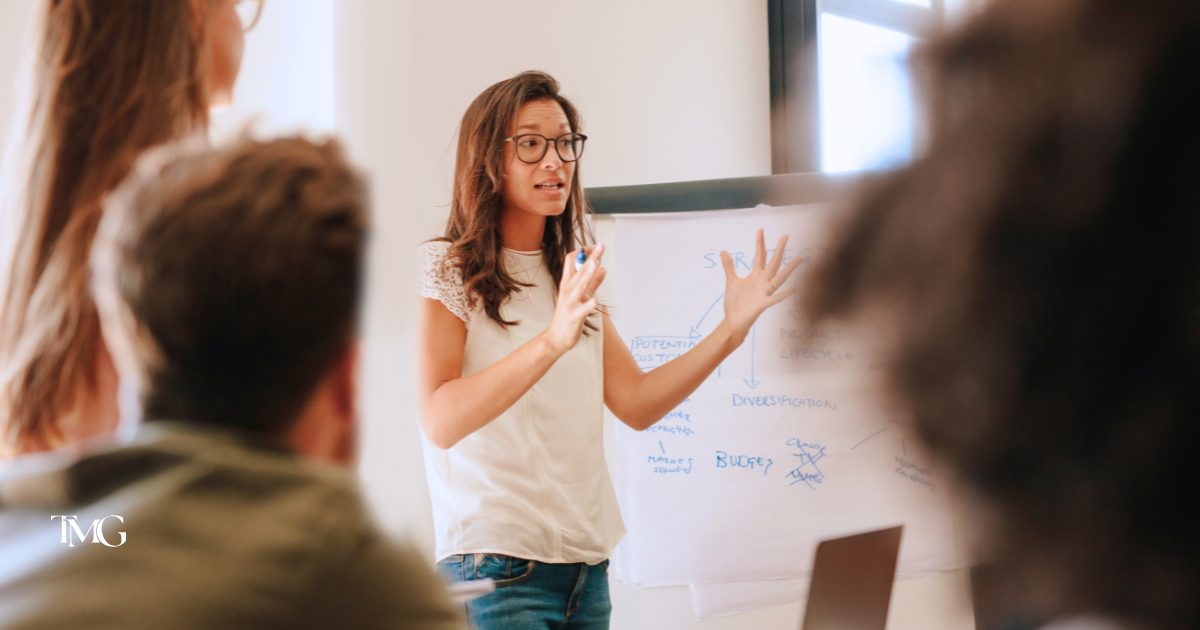A team reviewing competitor advantage for benchmarking your website to compete.