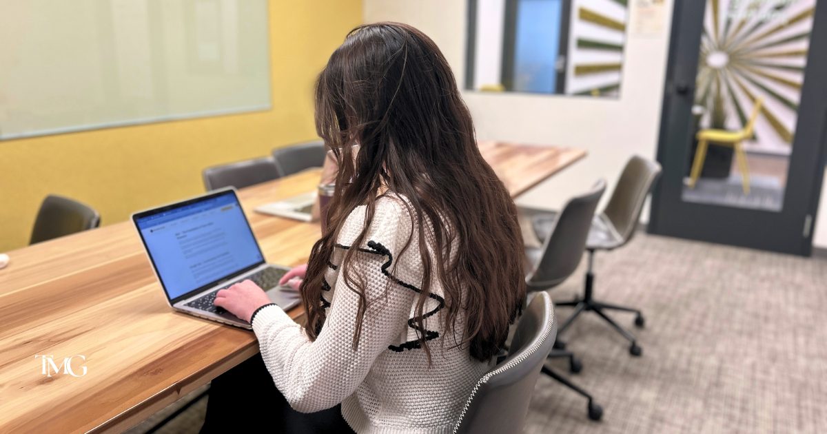 Rebecca reviewing the Email Drip Campaign strategy at the molo group office in Charlotte, NC.