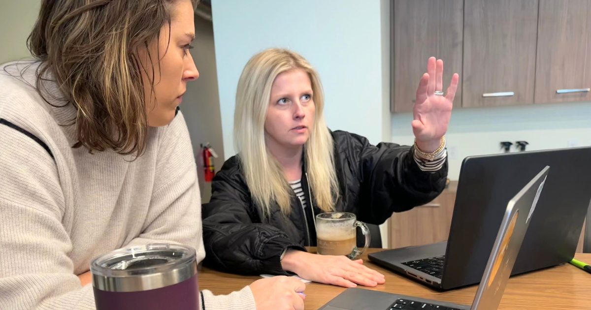 TMG's founder and director strategizing about adaptive ad strategies and how to use google analytics for seo.