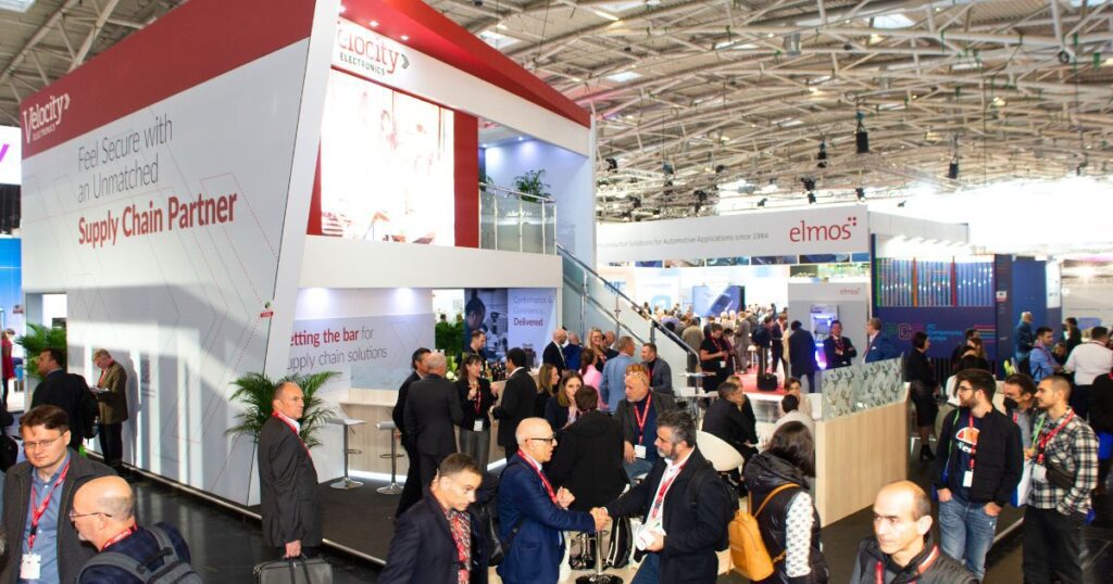 Crowded tradeshow floor showcasing Velocity Electronics’ standout booth at Electronica