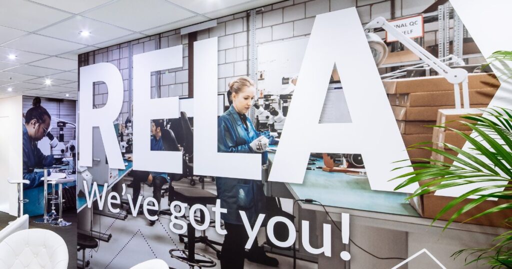 Custom Relax wall graphic design highlighting Velocity’s client-first messaging
