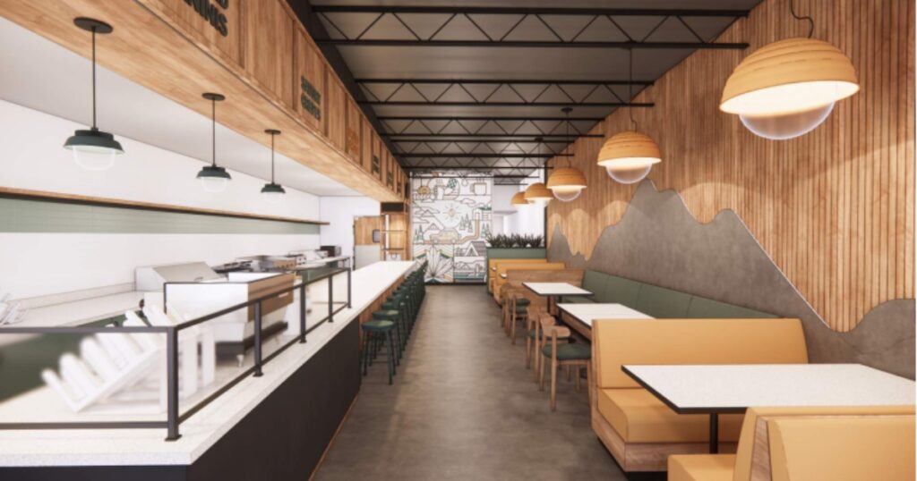 An architectural rendering (property of River Valley Architects) of a sleek, modern dining area at Griddled featuring warm wood textures, custom lighting, and a mountain-themed mural.