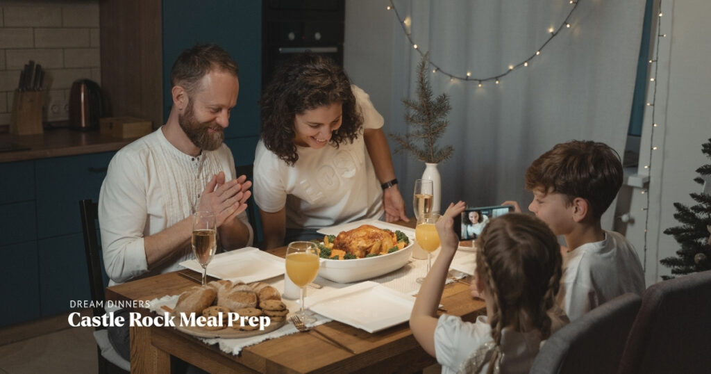 Family enjoying a shared meal at home, reflecting the customer experience and brand values supported through Dream Dinners’ website UX strategy.